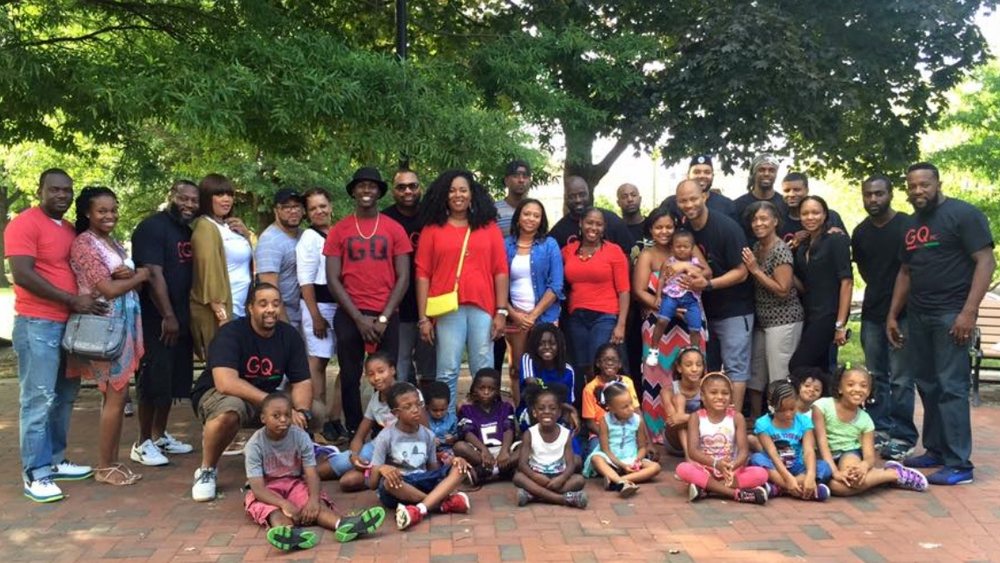 Gentlemen of Quality members with families and children at a community day